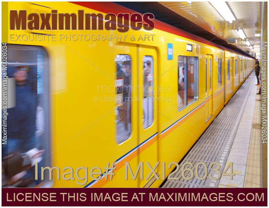 Subway train arriving to a platform in Japan