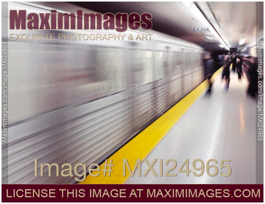 Subway train arriving to a platform