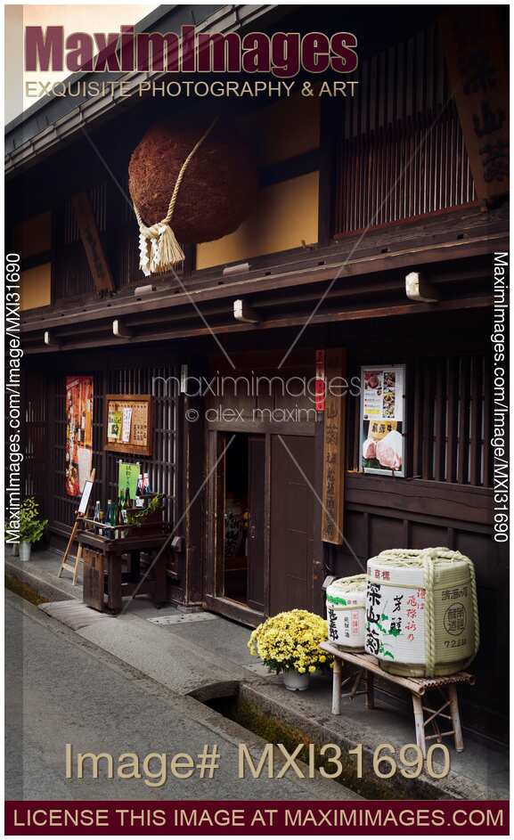 Sugidama cedar ball hanging above the entrance of a sake brewery in Takayama Japan