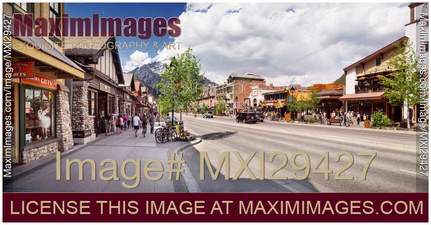 Sunny day summer scenery of Banff Avenue street in the Town of Banff in Alberta Rockies