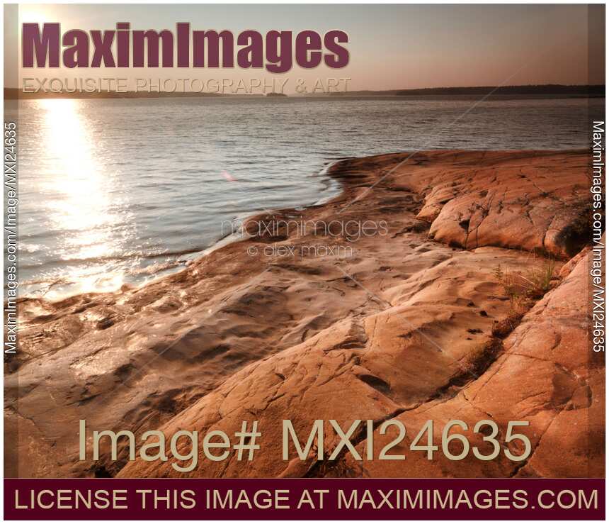Sunrise over Georgian Bay's red shore at Killbear