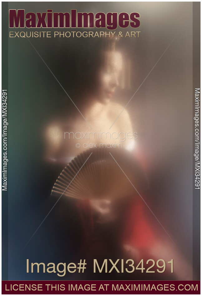 Surreal portrait of beautiful Japanese geisha or courtesan with sensually bared shoulders behind misty glass