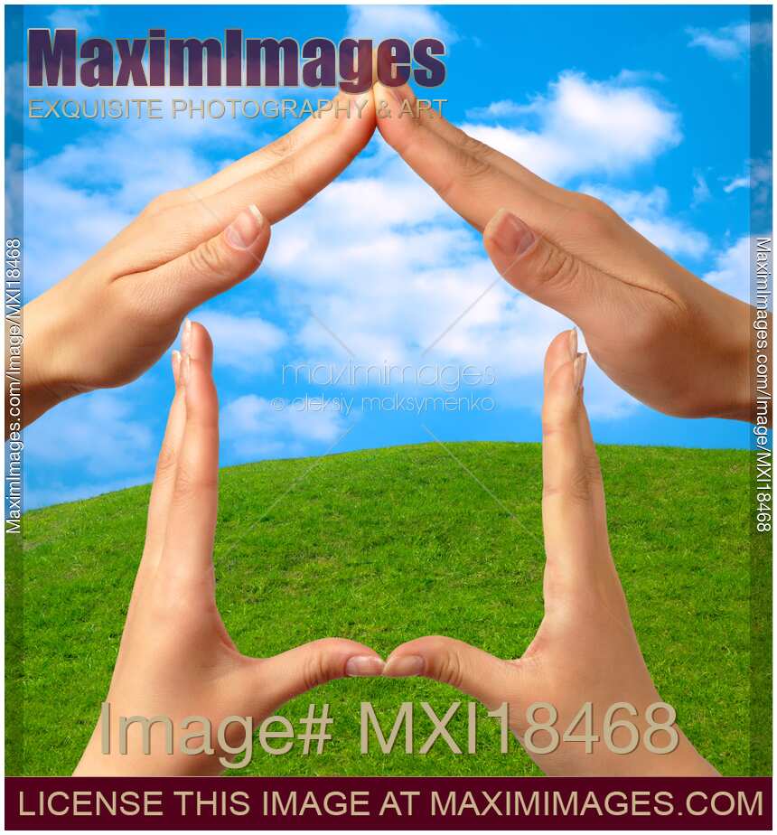 Symbol home over green summer landscape