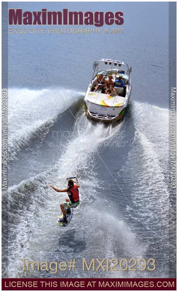 Teenage Girl Riding Wakeboard