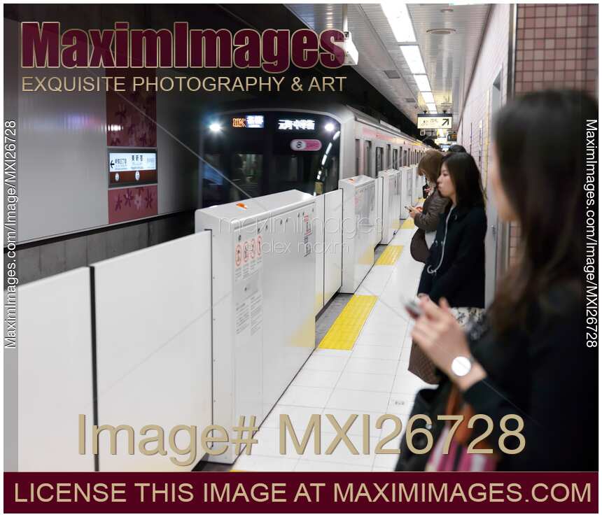 Tokyo Metro subway train arriving to platform