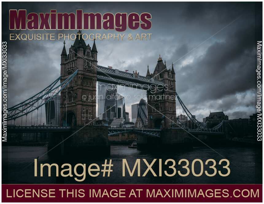 Tower Bridge in London across river Thames Dramatic moody city scenery