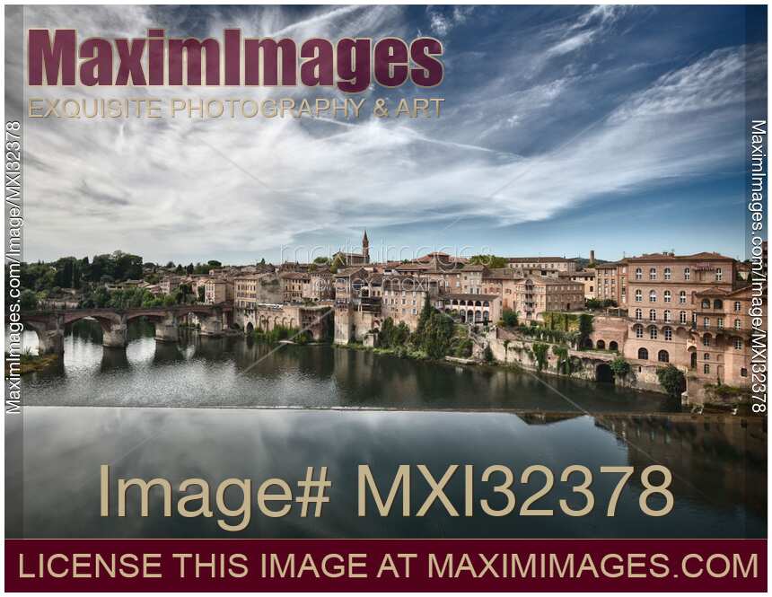 Town of Albi South of France Artistic dramatic scenery of historic buildings along the banks of river Tarn