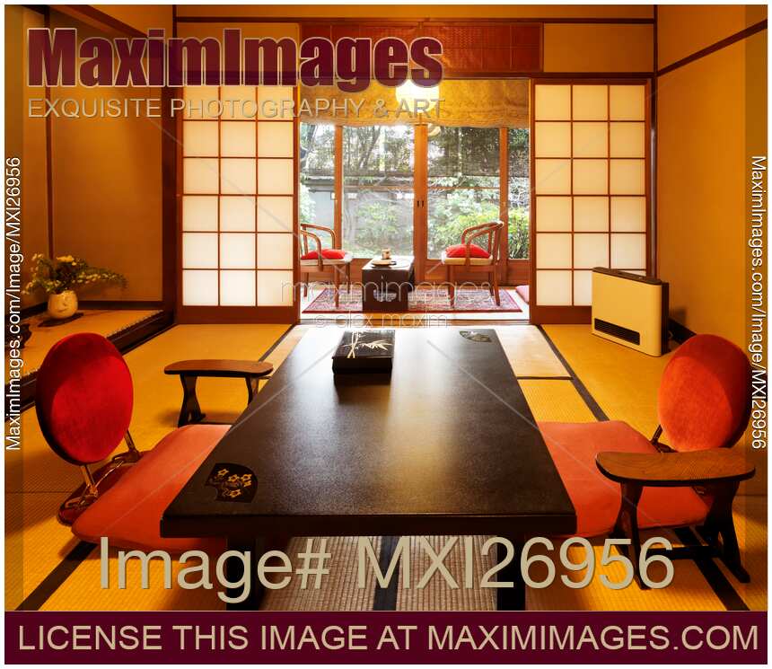 Traditional Japanese tea table and chairs at ryokan hotel room