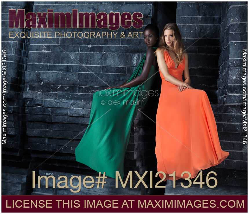 Two Beautiful Women in Elegant Long Dresses