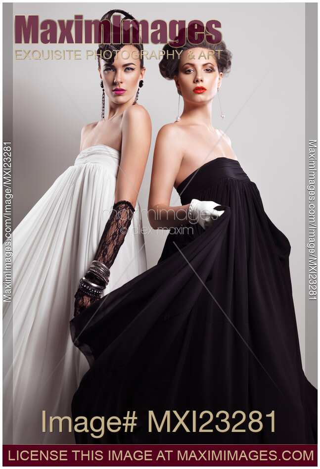 Two Beautiful Women in Long Dresses