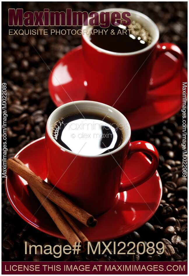 Two Cups of Coffe on Coffee Beans