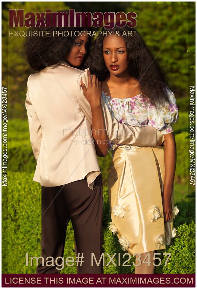 Two Fashionable Women in a Park