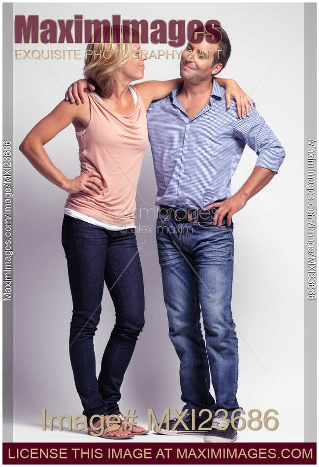 Two Fashionably Dressed Young People