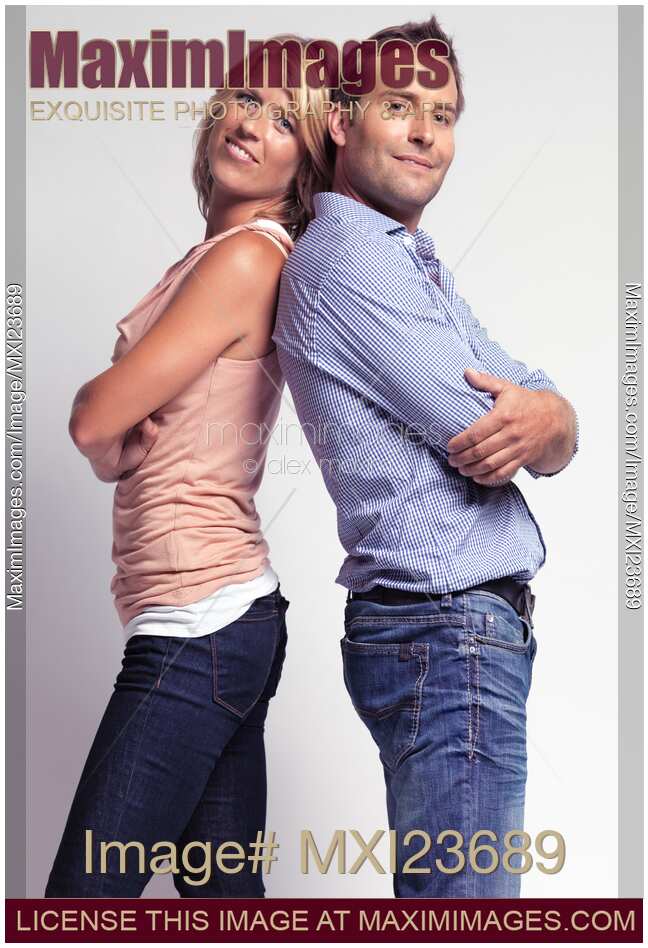 Two Fashionably Dressed Young People