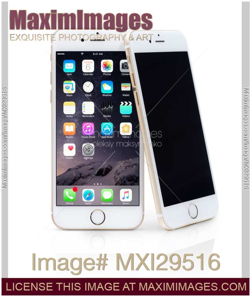 Two Gold Apple iPhones 6 6s isolated on white