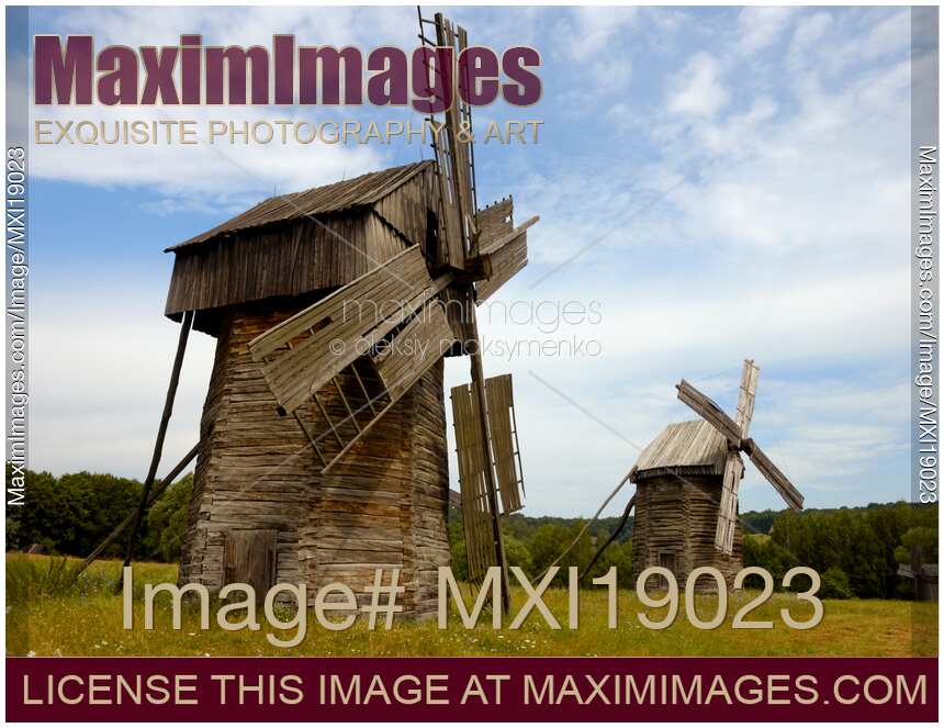 Two Windmills in a Field