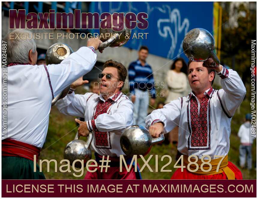 Photo of Ukrainian athletes juggling kettlebells Stock Image MXI24887