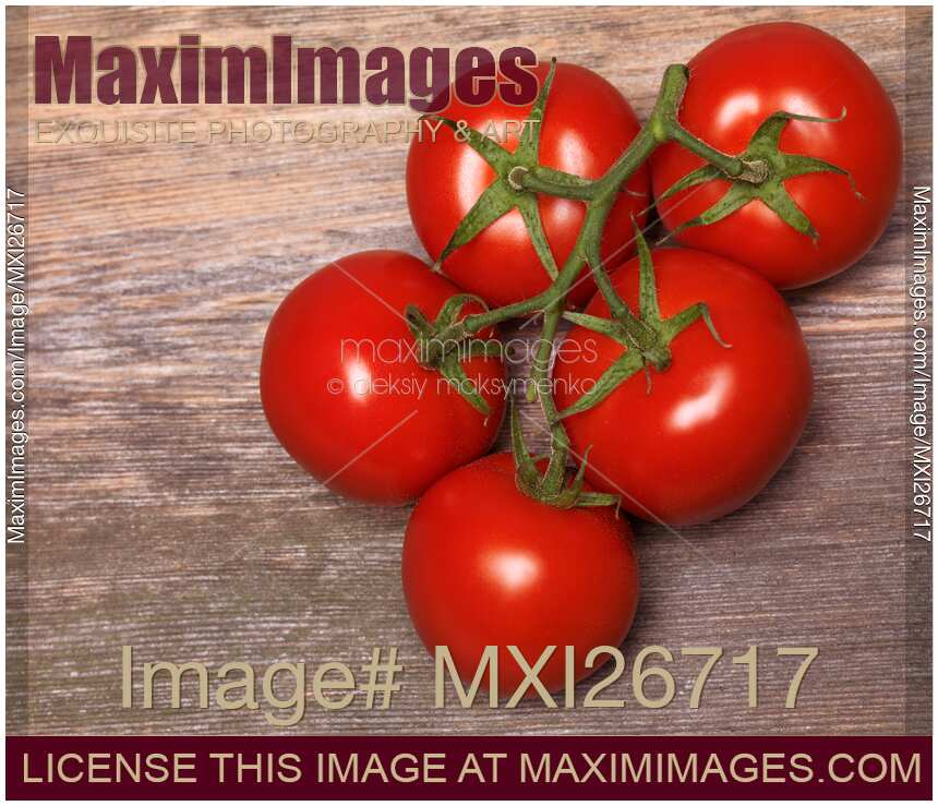 Vine tomatoes on wood