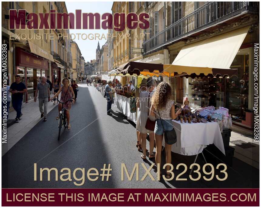 Visitors and vendors at street market in Aix-en-Provence South of France