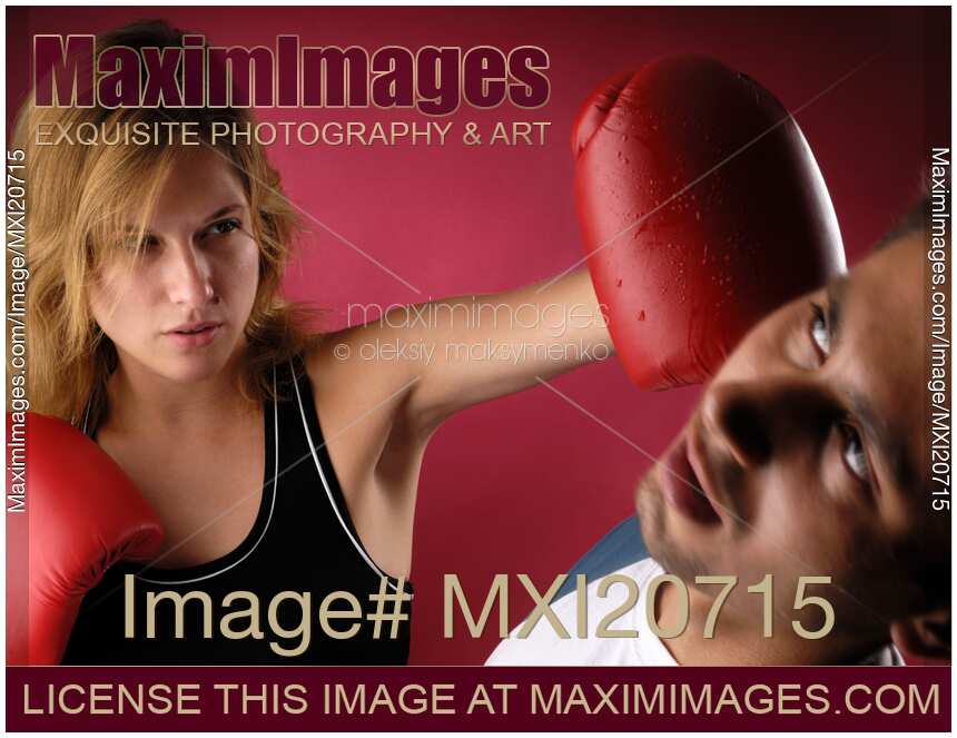 Woman Boxer Punching a Man in the Face