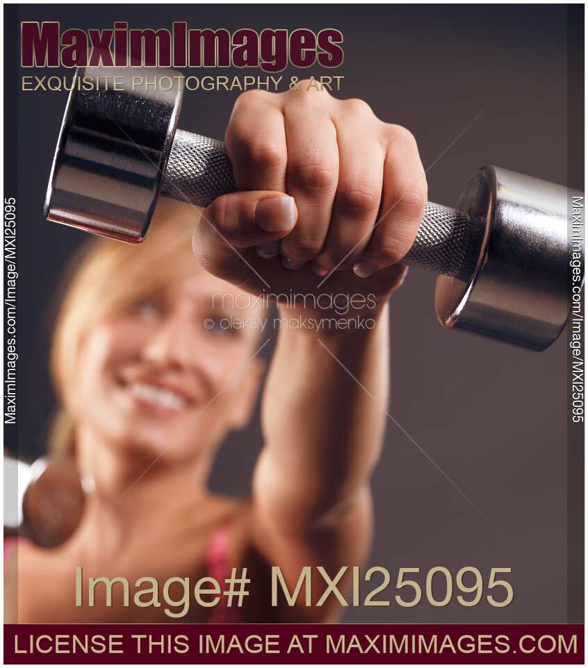 Woman exercising with weights