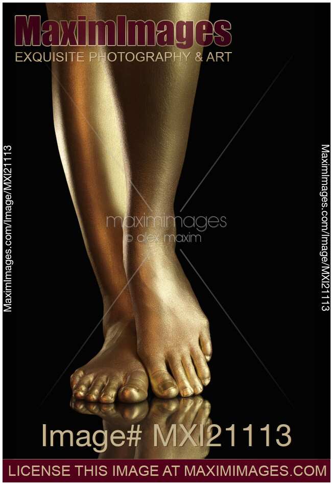 Woman Golden Legs and Feet Closeup
