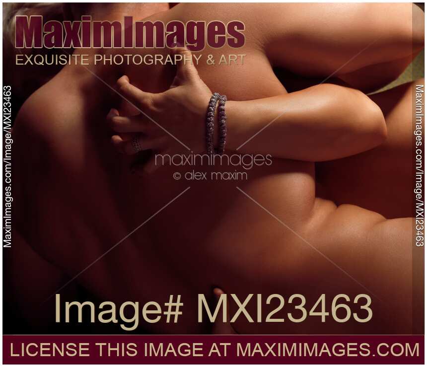 Woman Grasping Muscular Man's Back