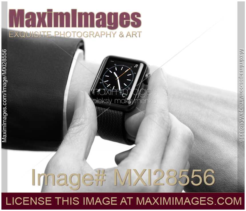 Woman hand with Apple Watch showing time