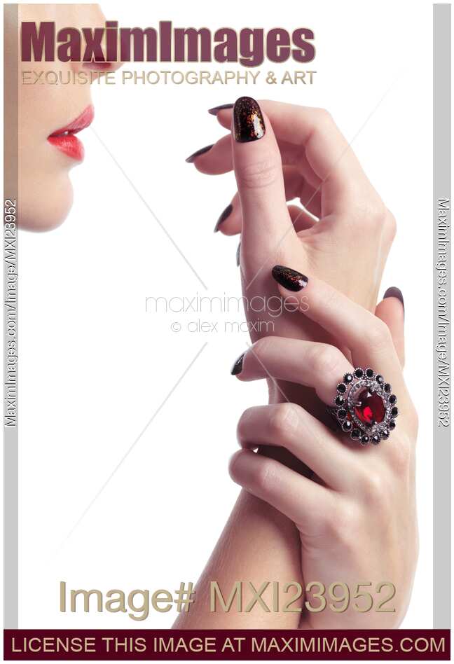 Woman Hands with Fancy Nail Polish and Red Lips