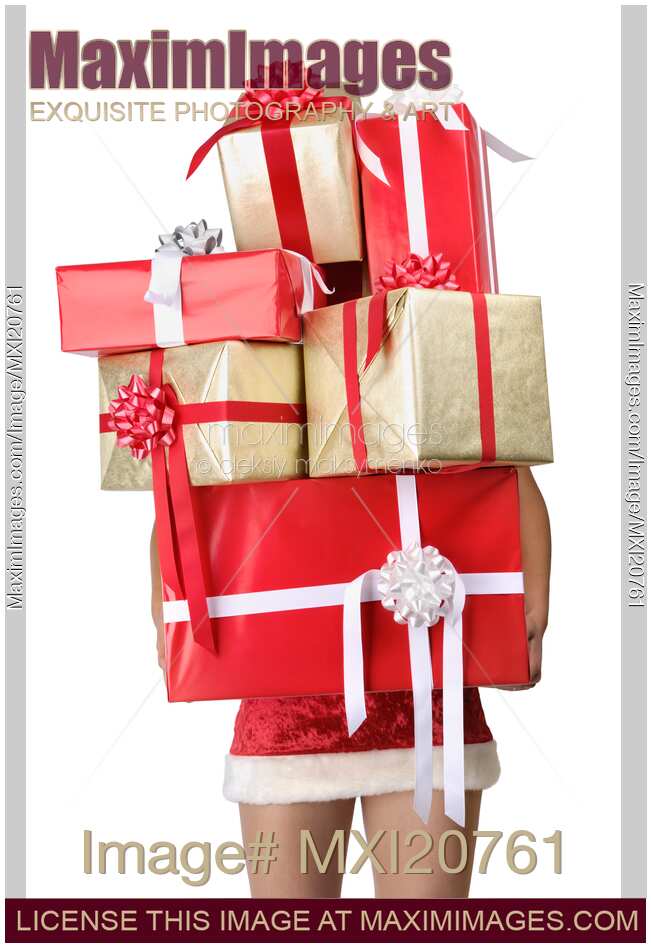 Woman holding a lot of Christmas gifts