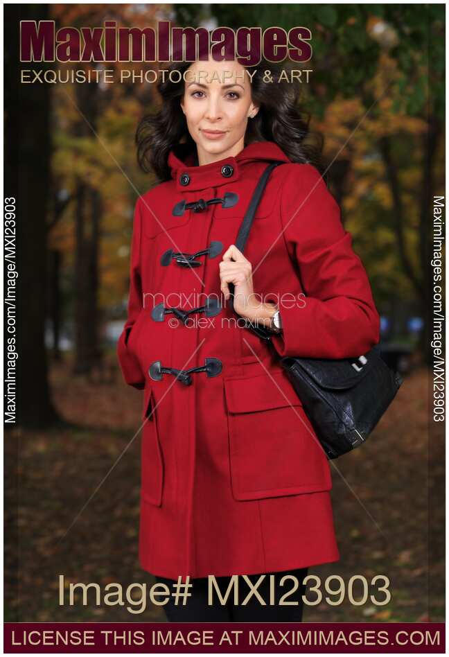 Woman in a Red Coat in Fall