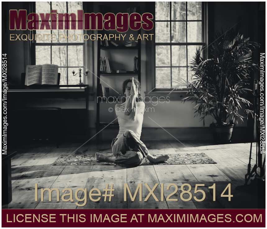Woman in artistic meditative yoga posture