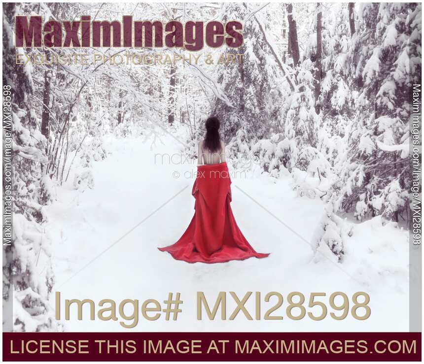 Woman in red kimono and bare shoulders walking away in snow