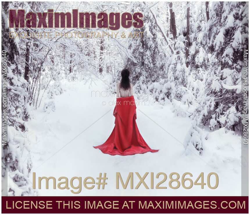 Woman in red kimono and bare shoulders walking away in snow