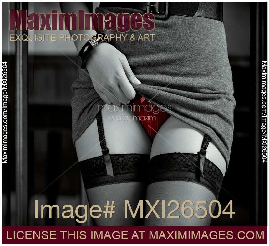 Woman in stockings showing her red sexy underwear