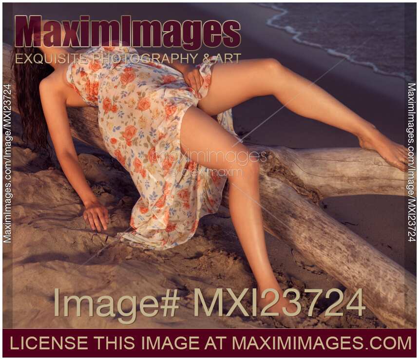 Woman in Summer Dress at the Beach