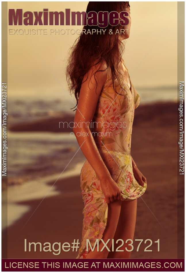 Woman in Wet Dress at the Beach