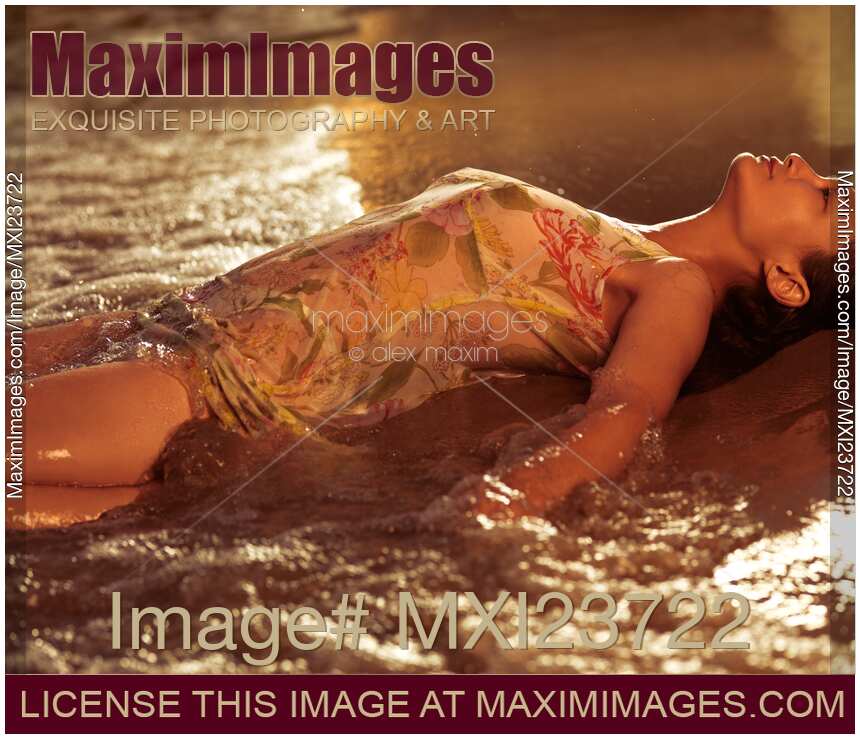 Woman in Wet Dress at the Beach