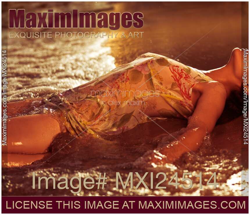Woman in Wet Dress at the Beach