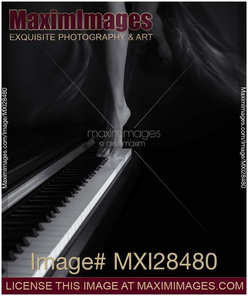 Woman legs dancing on piano Black and white