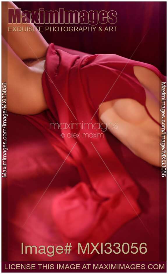 Woman lying half naked in red dress lifted revealing her nude sexy body Abstract erotica