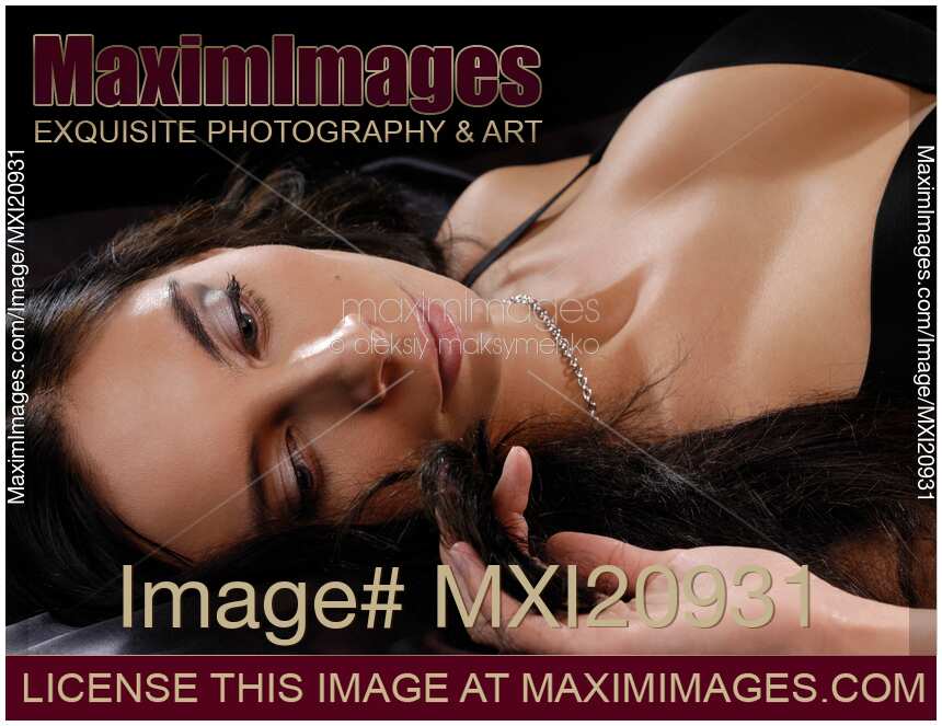 Woman Lying in Bed