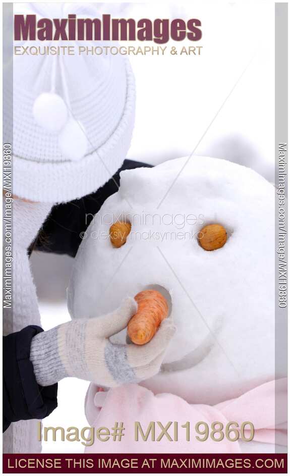 Woman Making a Snowman