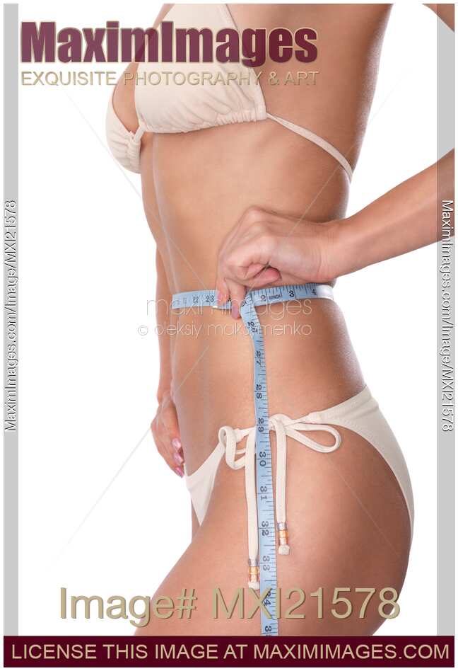 Premium Photo  Close up of slim woman measuring her waist's size