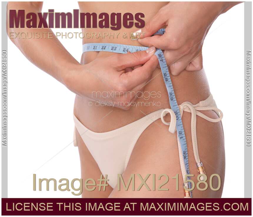 Woman Measuring Her Waist