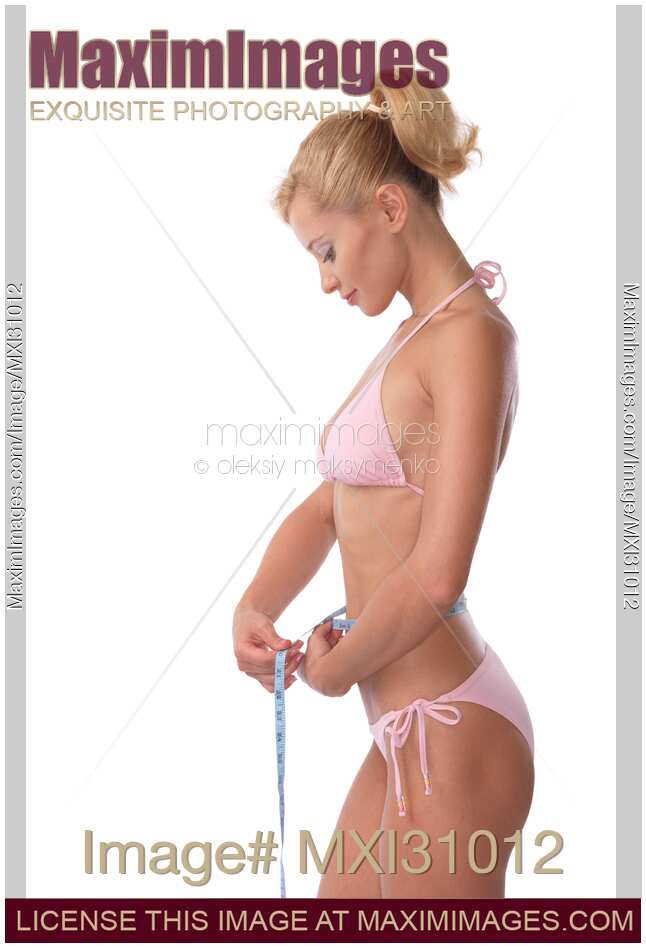 Woman Measuring Her Waist