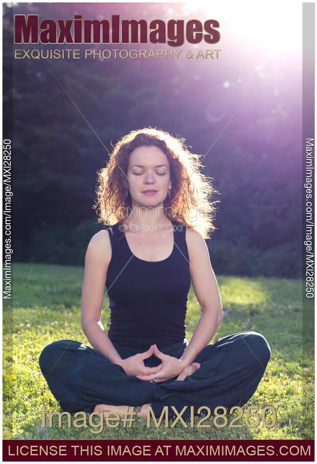 Woman meditating in the nature