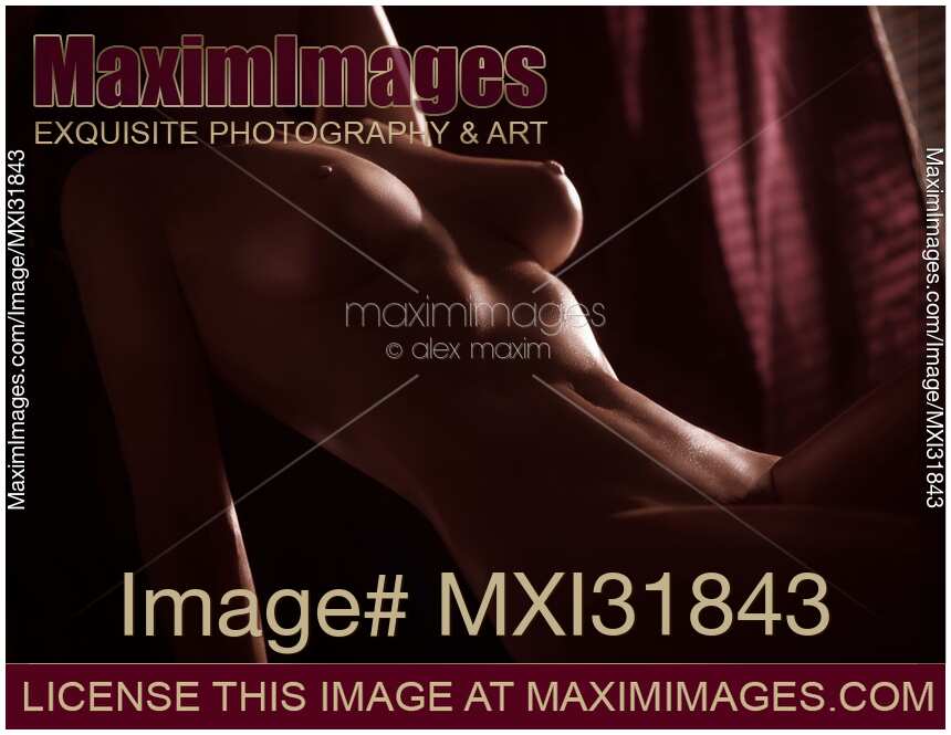 Woman sexy nude body with beautiful smooth shiny dark brown skin