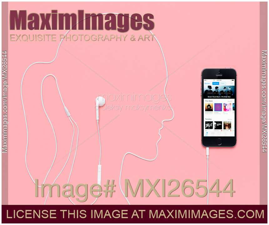 Woman silhouette with iPhone headphones iTunes music concept
