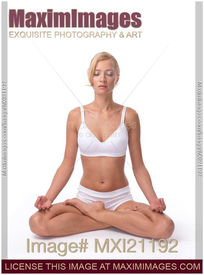 Woman Sitting in Lotus Pose